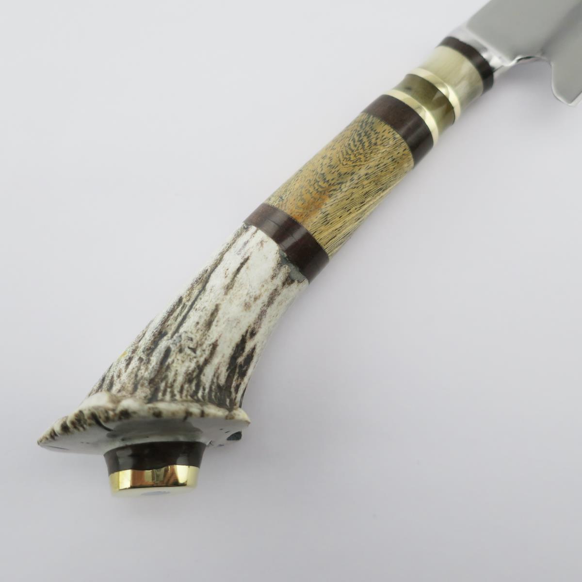 Deer 5.5-inch stainless steel knife with an antler handle and brass accents. This hunting knife is perfect for outdoor enthusiasts and collectors, featuring a unique, rustic design.