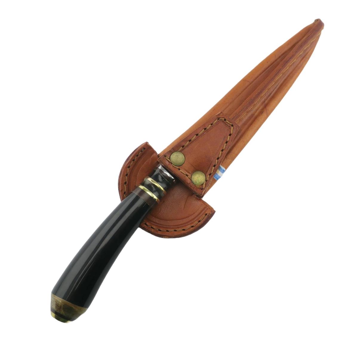A traditional Cow 6.3 inch dark handle stainless steel knife with a brown leather sheath, perfect for outdoor activities or collecting.